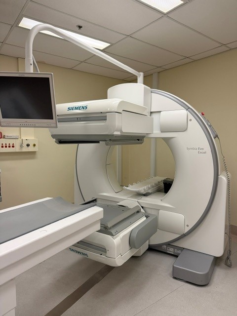 Siemens Symbia Evo Excel — Nuclear Medicine 2022 Siemens Symbia Evo Excel dual-head SPECT gamma camera for sale — angled view of gantry, detectors and patient table at MTC Miami, Florida